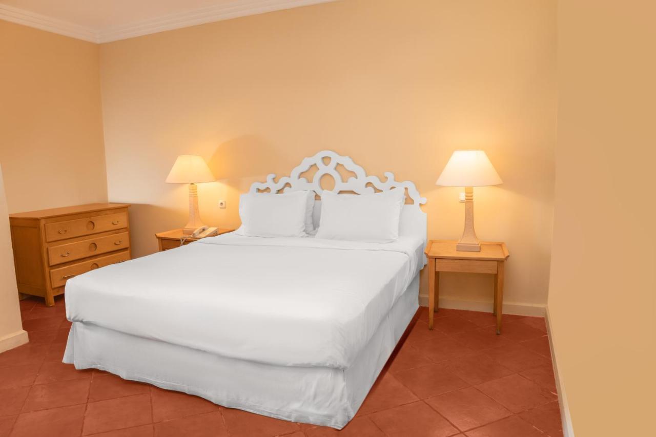Sharm Dreams Vacation Club - Aqua Park酒店 外观 照片 A bed with a bed skirt