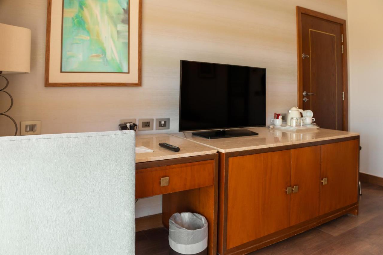 Sharm Dreams Vacation Club - Aqua Park酒店 外观 照片 A television in a hotel room